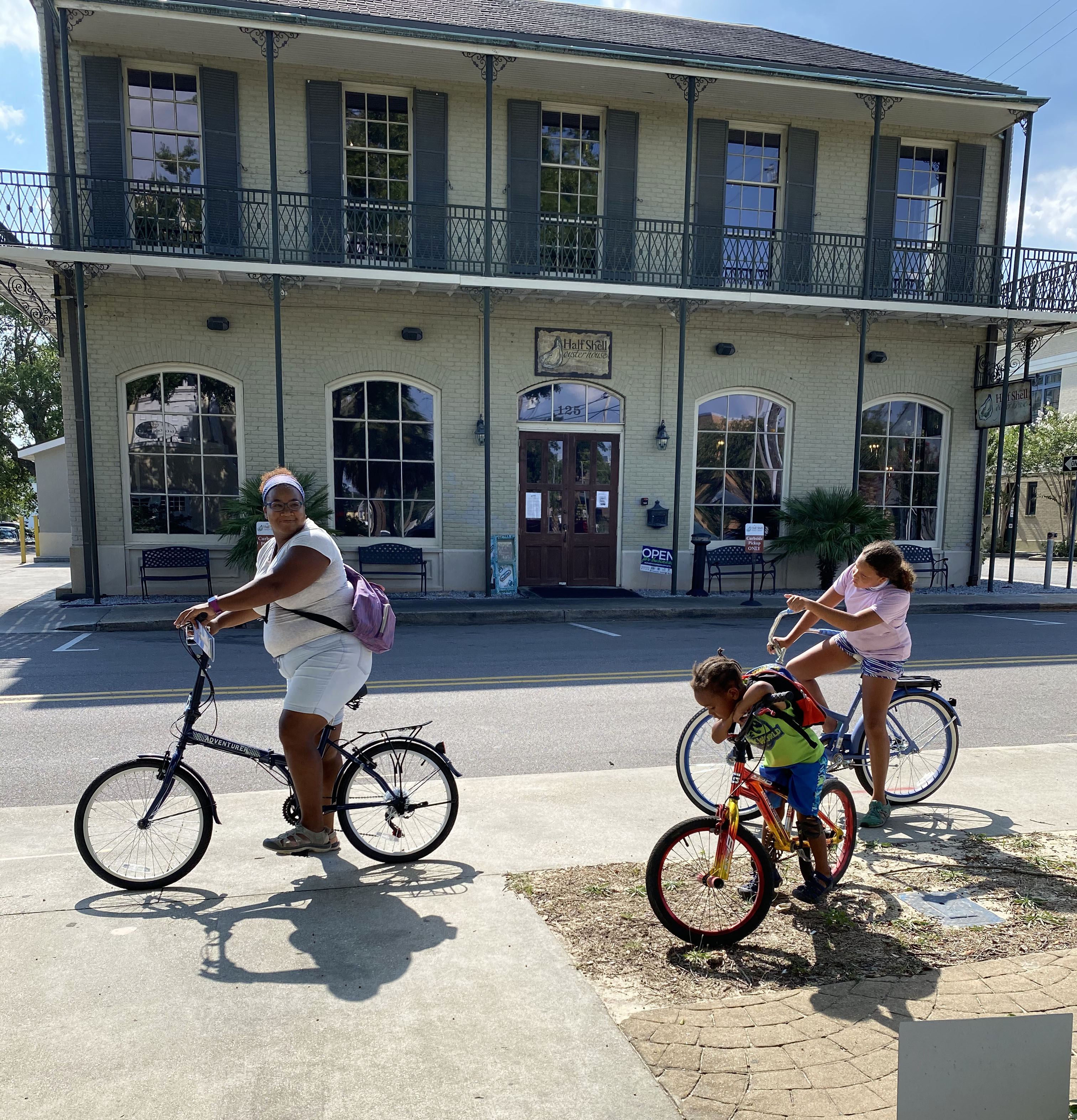 biloxi ms bri jj zee riding bikes downtown